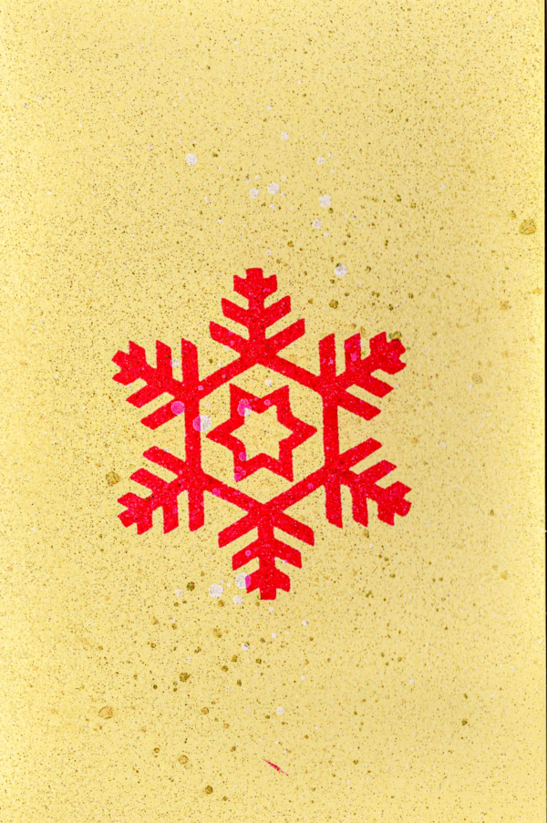 Handmade premium cardstock greeting card featuring a red snowflake design by Pickle Paper.